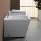 Bideu cu o singură gaură, montat pe podea, din ceramică albă, cu un design modern și elegant - Giunco Viadurini