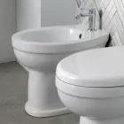 Bideu cu o singură gaură, montat pe podea, din ceramică albă, cu un design modern și elegant - Silica Viadurini