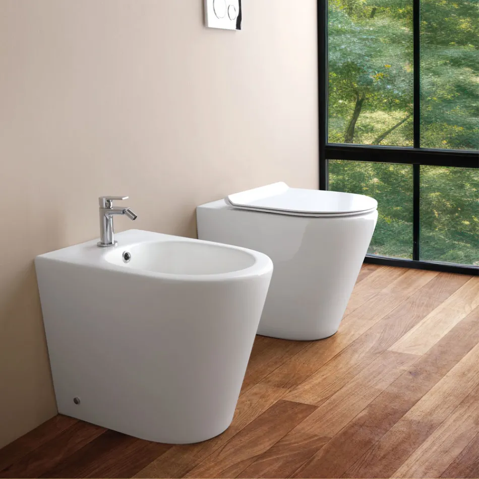 Bideu cu o singură gaură, montat pe podea, din ceramică albă, cu design modern - Ginepro Viadurini