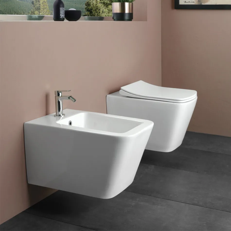 Bideu suspendat cu o singură gaură din ceramică albă, cu un design modern și elegant - Giunco Viadurini