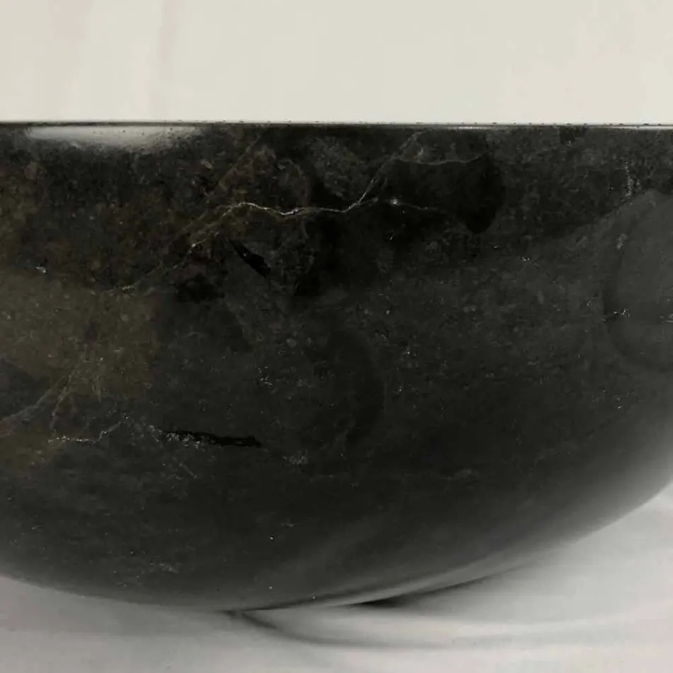 Lavoar rotund negru pe blat din piatră naturală Levi, piesă unică Viadurini