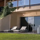 Sezlong de exterior din Polyrattan cu roti - Meredith Viadurini