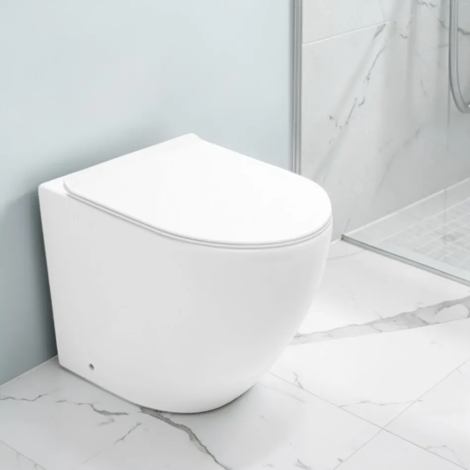 Toaletă ciclonică Aralia din ceramică albă, montată pe podea, cu capac cu închidere silențioasă Viadurini