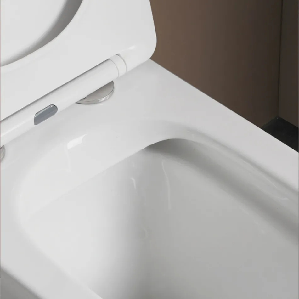 Toaletă montată pe podea cu capac ceramic cu închidere silențioasă și design modern - Giunco Viadurini