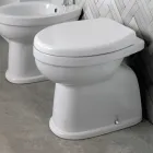 Toaletă ceramică montată pe podea cu capac din poliester și design modern - Silica Viadurini
