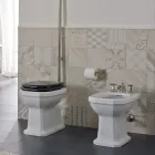 Vază din ceramică albă cu scaun negru fabricată în Italia - Nausica Viadurini