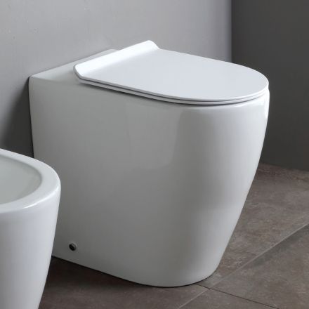 Toaletă fără ramă cu capac ceramic termorezistent cu închidere silențioasă - Oleander Viadurini