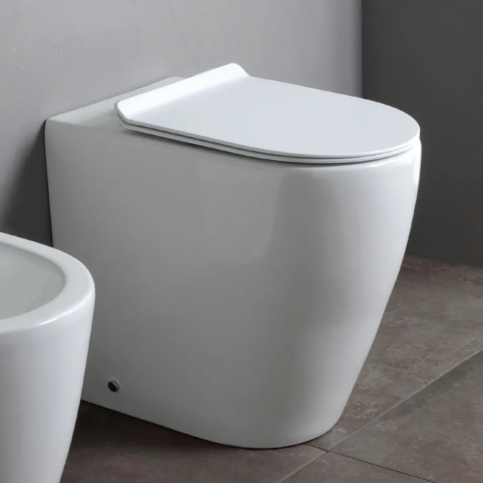 Toaletă fără ramă cu capac ceramic termorezistent cu închidere silențioasă - Oleander Viadurini