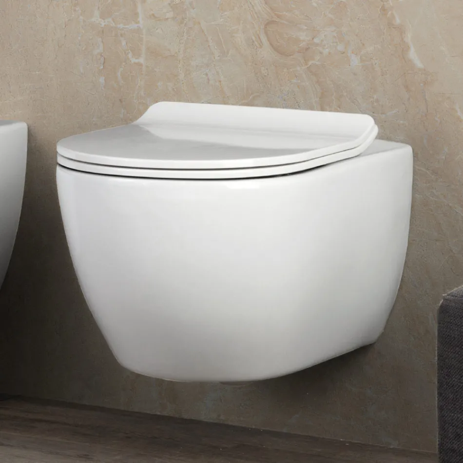 Toaletă suspendată fără ramă din ceramică albă Aster, cu capac cu închidere silențioasă Viadurini
