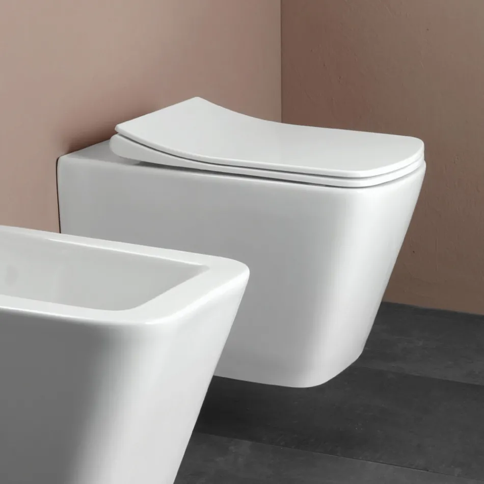 Toaletă suspendată cu capac ceramic cu închidere silențioasă, design modern - Giunco Viadurini
