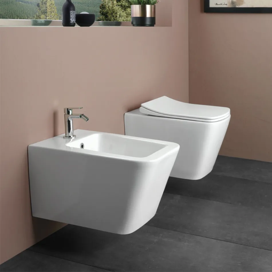 Toaletă suspendată cu capac ceramic cu închidere silențioasă, design modern - Giunco Viadurini