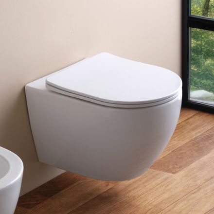 Toaletă suspendată fără ramă cu capac ceramic cu închidere silențioasă - Juniper   Viadurini